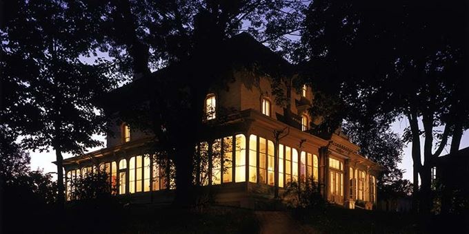 The Villa Louis mansion at twilight