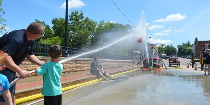 Wacky water fun at the 2019 Children&#39;s Water Fight sponsored by the River Falls Fire Department.