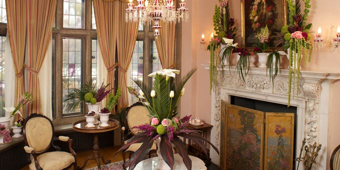 Floral arrangements inspired by the historic room.
