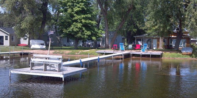Relax and enjoy this waterfront vacation home on Shawano Lake&#39;s west shore.