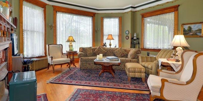 Relax in the Common Room at the Fargo Mansion Inn.