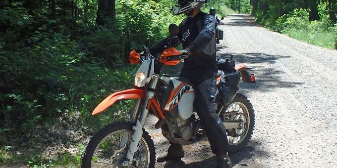 A dual sport rider enjoying the backroads and forest paths in the Boulder Junction area.