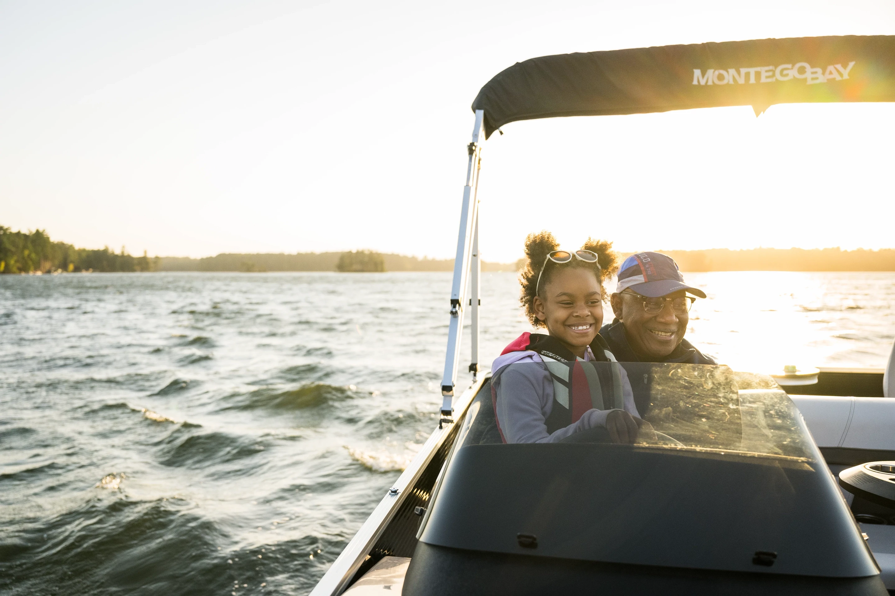 0381-Girl Drives Pontoon Boat-Minocqua 0381-Girl Drives Pontoon Boat-Minocqua