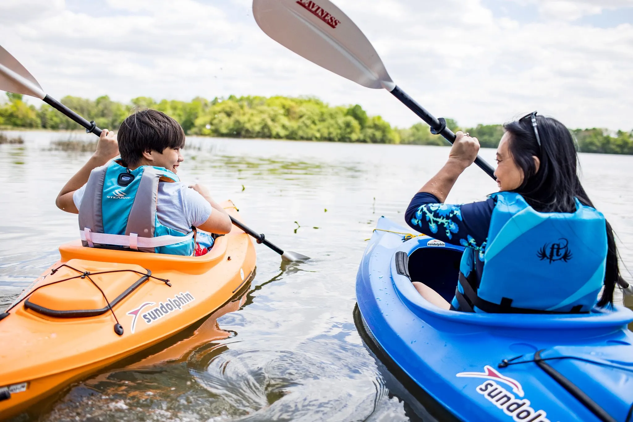 mother and son kayaking mother and son kayaking