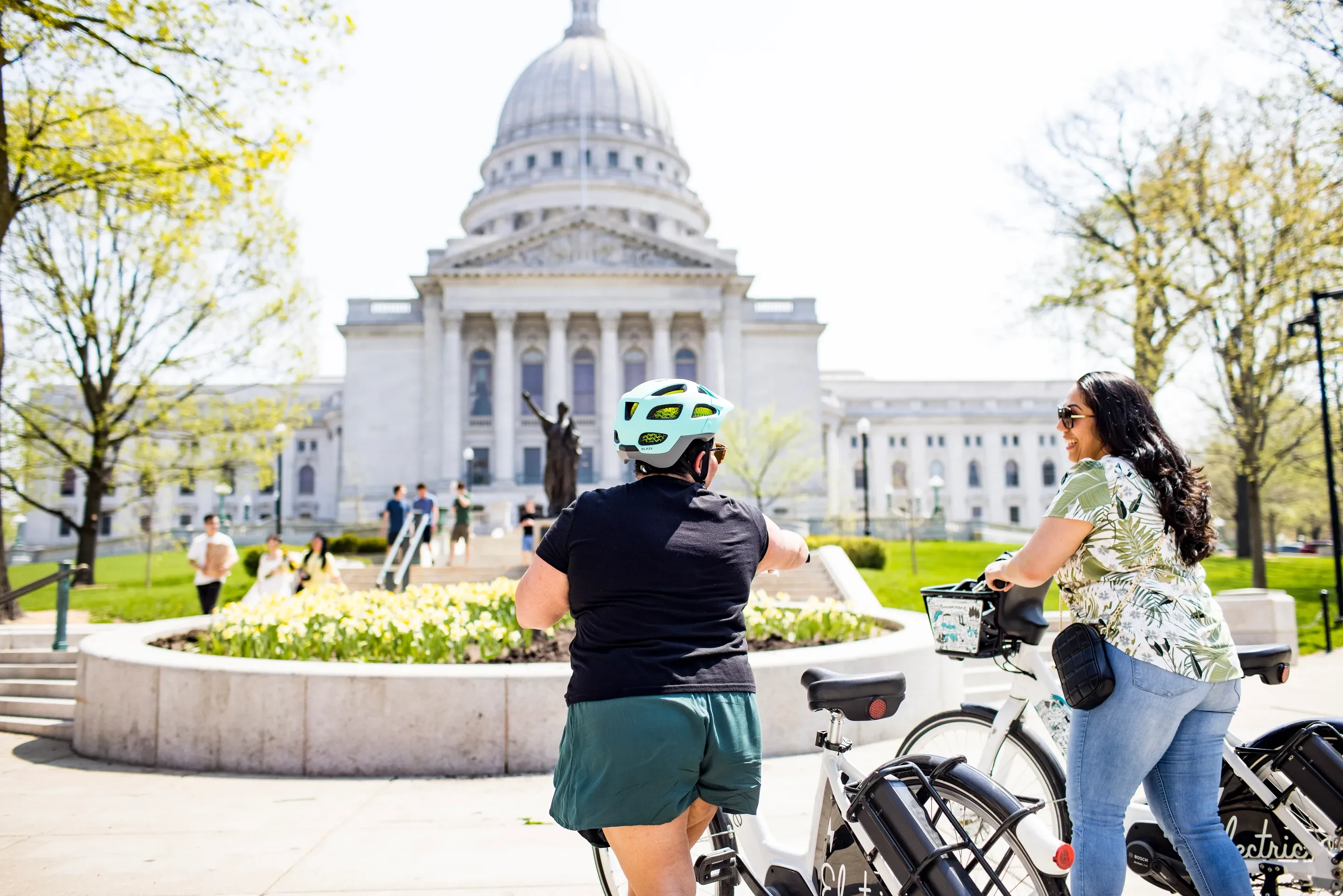 049 Women Ride Bicycles Near Capitol In Madison 049 Women Ride Bicycles Near Capitol In Madison