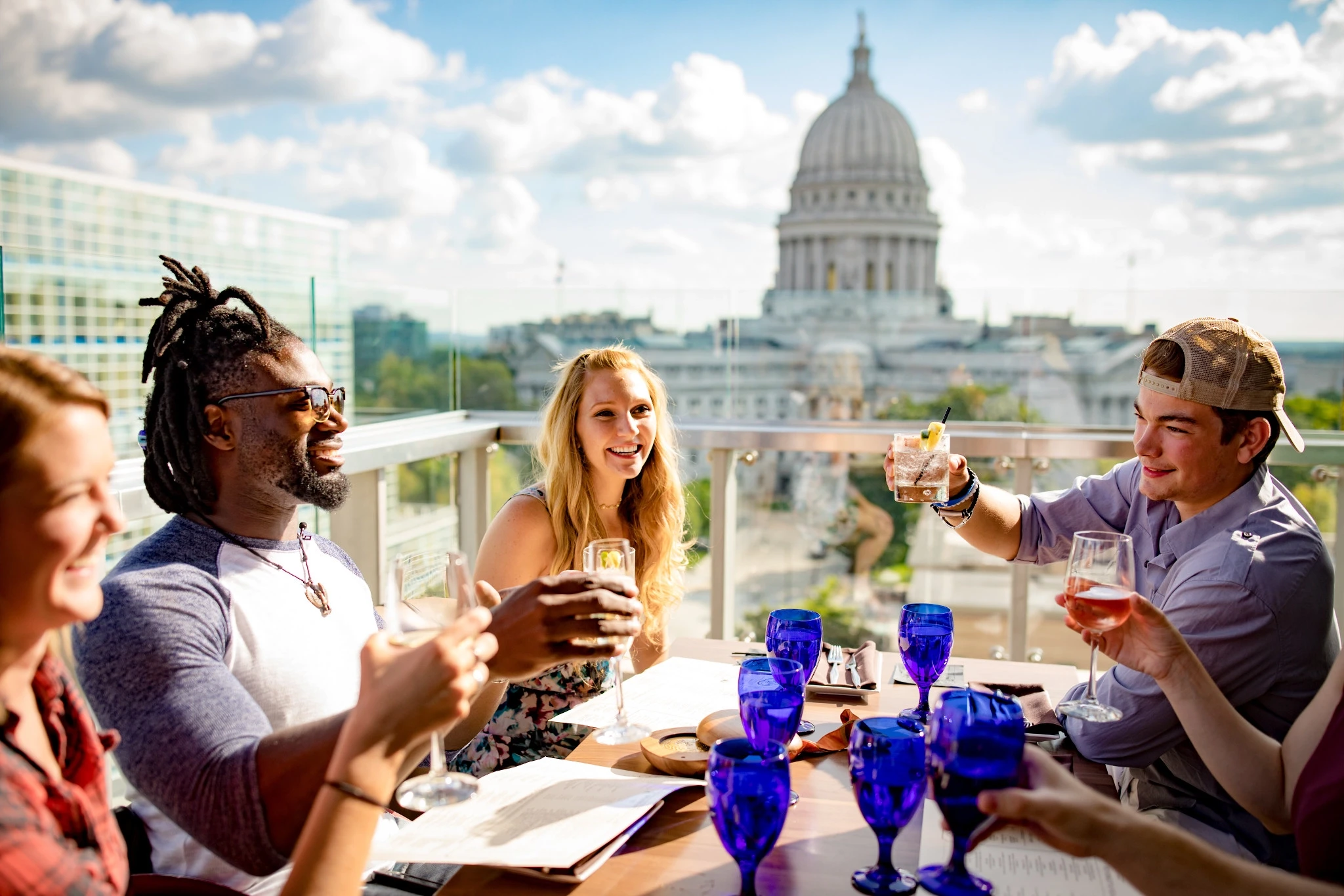 Friends Toasting Drinks at Eno Vino Rooftop 2