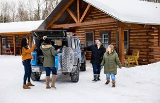 bd25124a-47b8-448f-a17a-37f1a74fb245-172-woman-unpacking-car-at-waubee-lodge-in-lakewood.