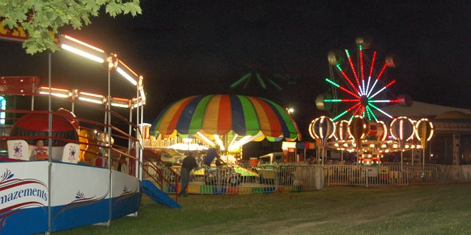 Enjoy the midway at the fair.