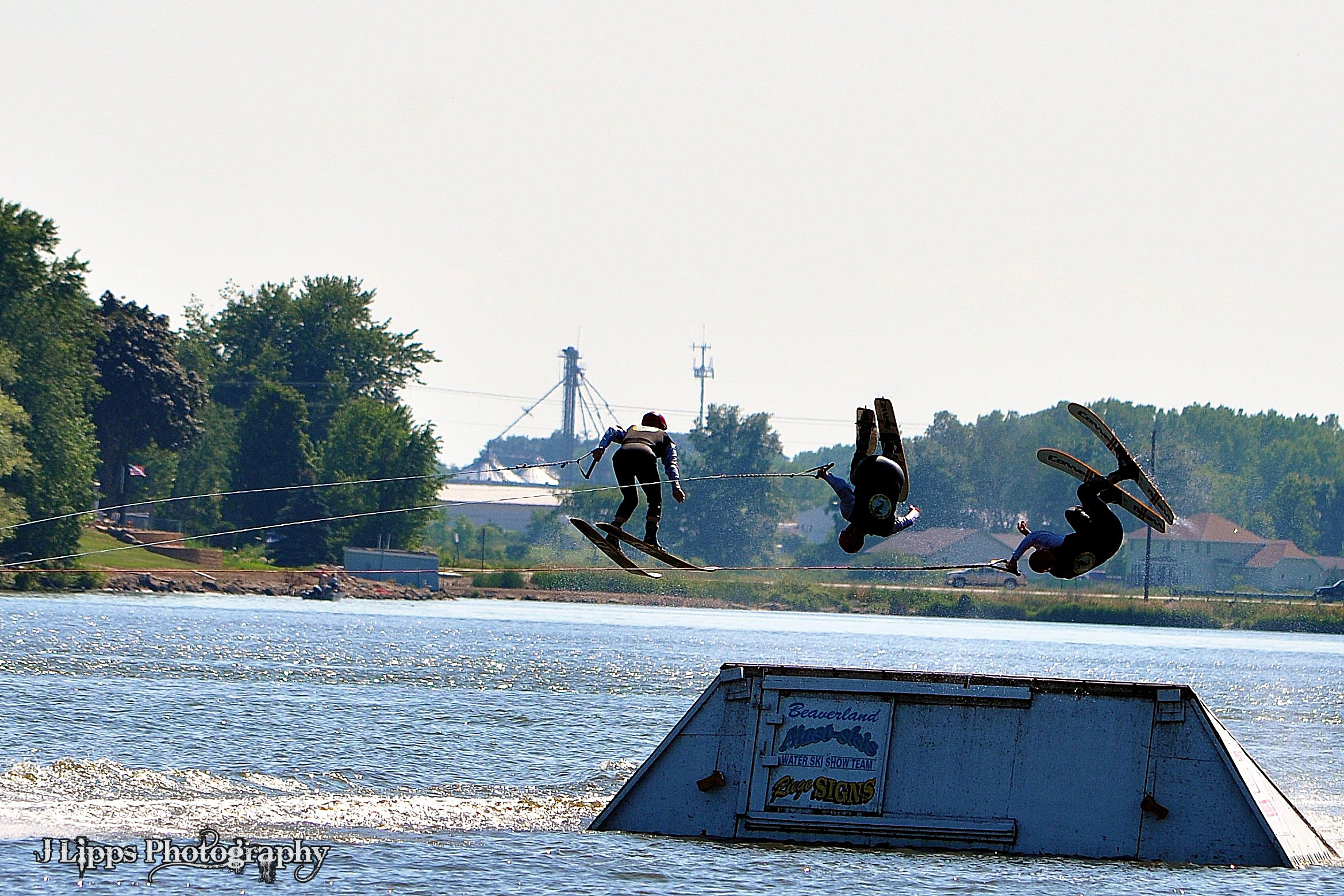 Skiiers perform flips during the 2013 Lake Days celebration.