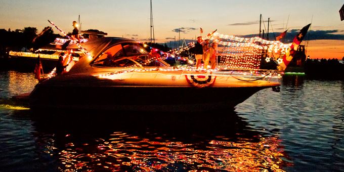 A venetian boat parade lights up the harbor at 8 PM!