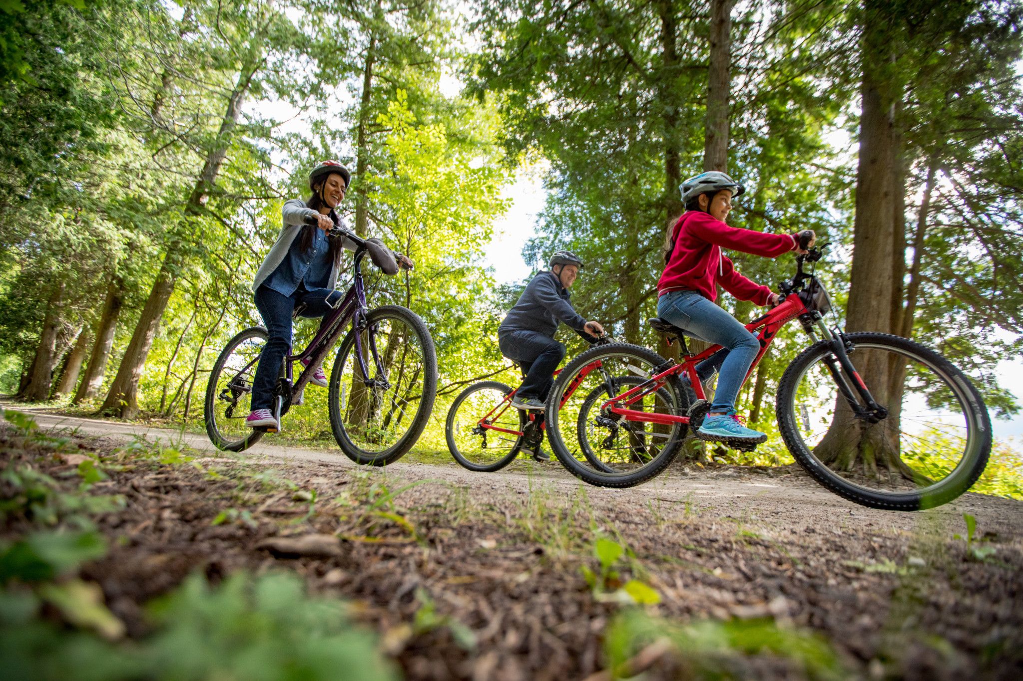 Family Biking on Trail at Peninsula State Park
