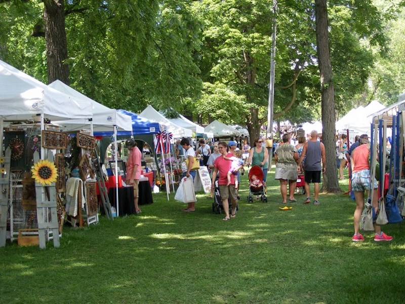 The trees of historic Swan Park provide nice shade for the Art in the Park Arts and Craft Fair