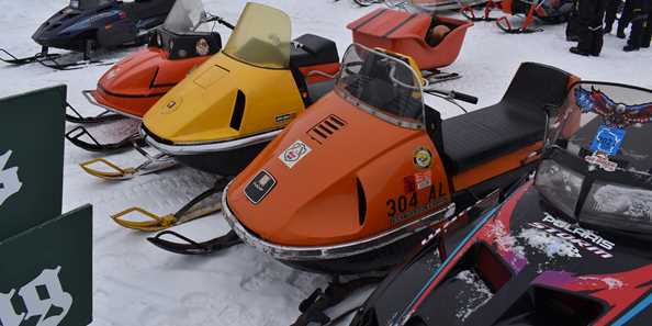 Some of the antique snowmobiles on display at the Classic Cruise.