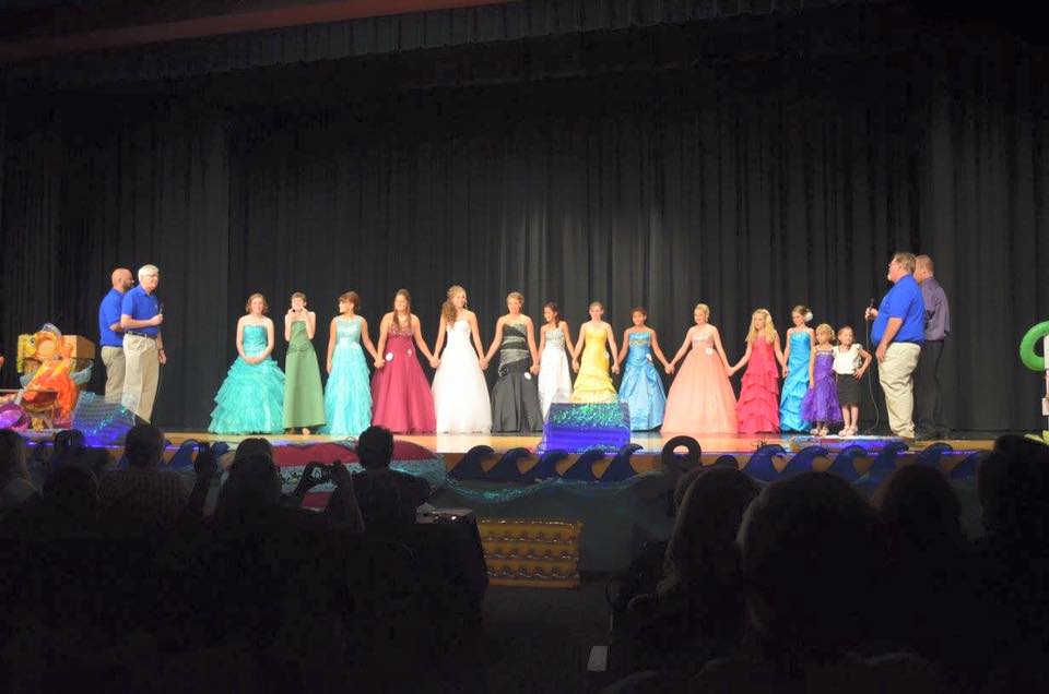 Siren Royalty Pageant candidates are serenaded as the votes are tallied.