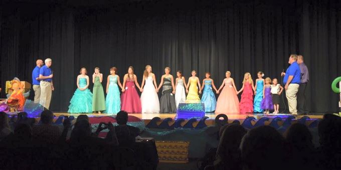 Siren Royalty Pageant candidates are serenaded as the votes are tallied.
