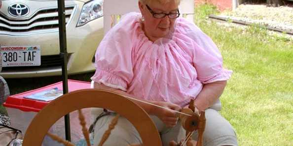 Spinning wool at the Lost Arts Fest