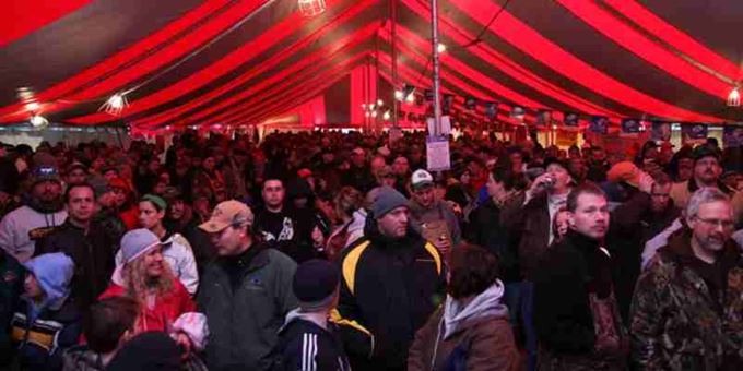 Battle on Bago attendees in event tent
