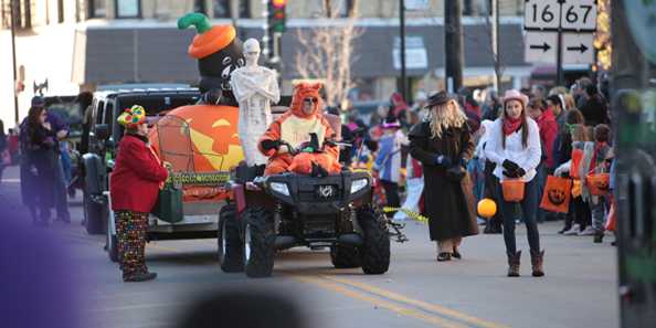 A float heads down Wisconsin Avenue for the annual downtown Oconomowoc Halloween Parade.
