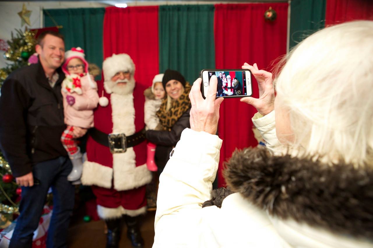 Santa does visit Oconomowoc for the German Christmas Market. Children can visit with him, and decorate cookies inside a heated tent.