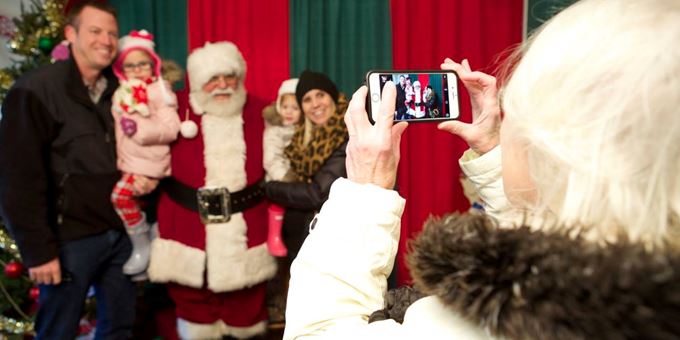 Santa does visit Oconomowoc for the German Christmas Market. Children can visit with him, and decorate cookies inside a heated tent.