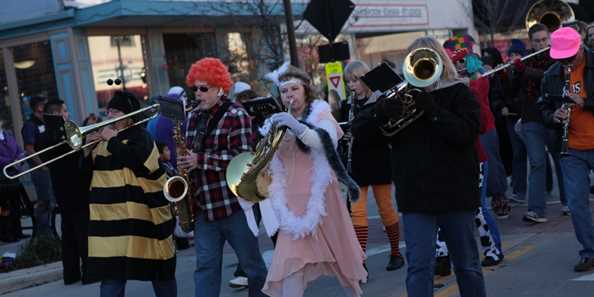 A marching band plays in the annual downtown Oconomowoc Halloween Parade.