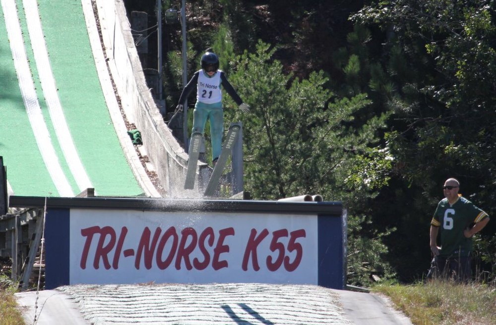 Individual flying off ski jump at Tri-Norse Ski Club and Winter Park.