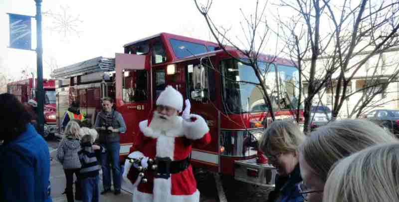 During Evansville's Olde Fashioned Christmas, Santa makes a surprise visit.  He arrives by local firetruck to the delight of kids of all ages.