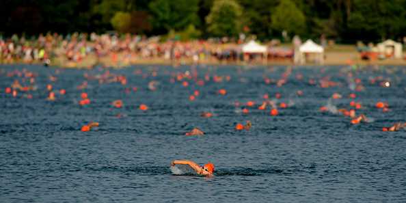 Lake Andrea Triathlons - athletes in the water.