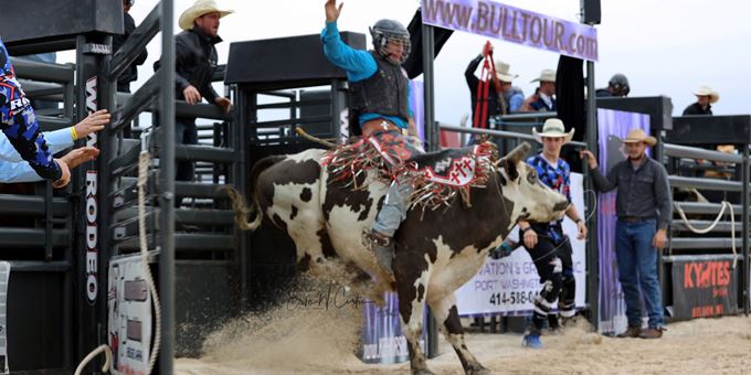 Experience the thrill and excitement of bull riding at its best on a charming Wisconsin farm.