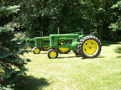 A row of John Deere Tractors
