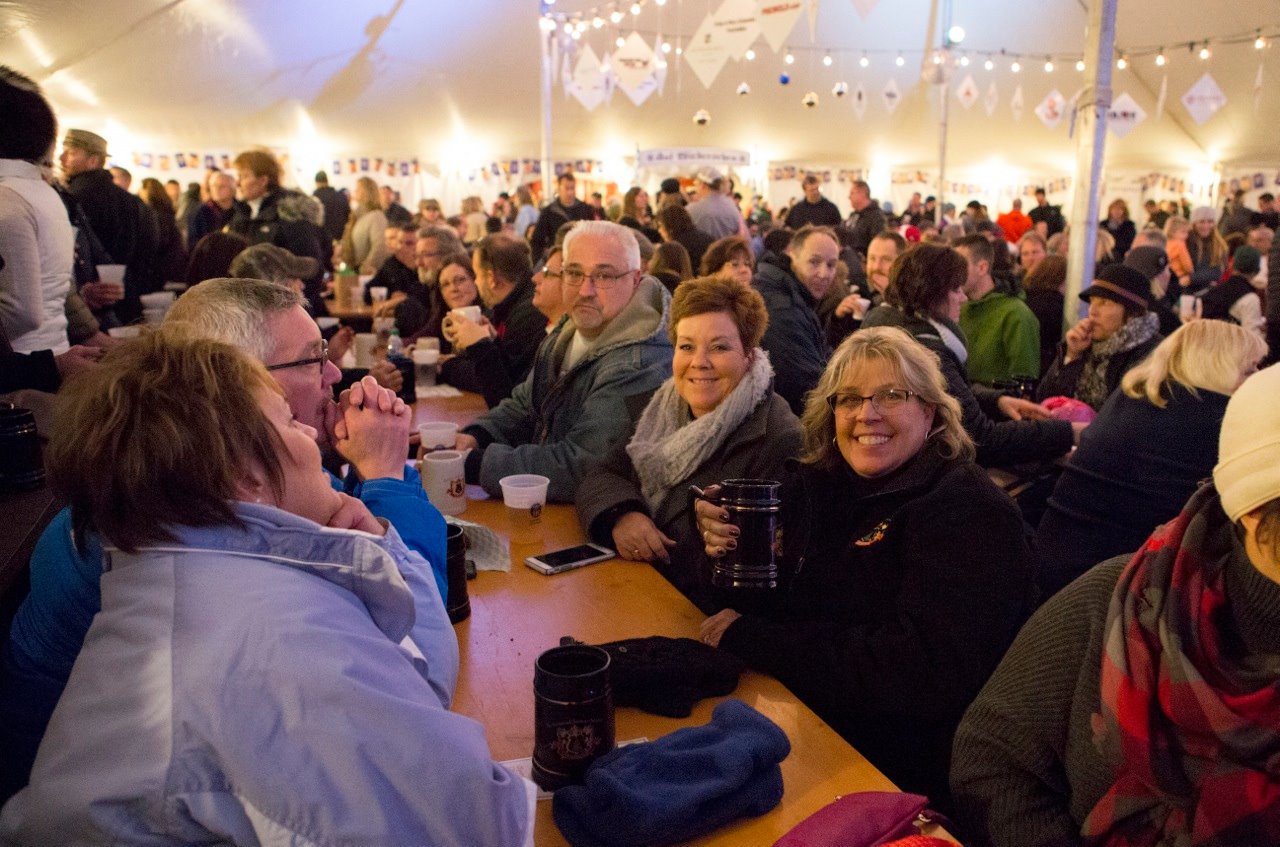Enjoy a beer, some food, music and good company inside the heated entertainment tent.