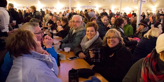 Enjoy a beer, some food, music and good company inside the heated entertainment tent.
