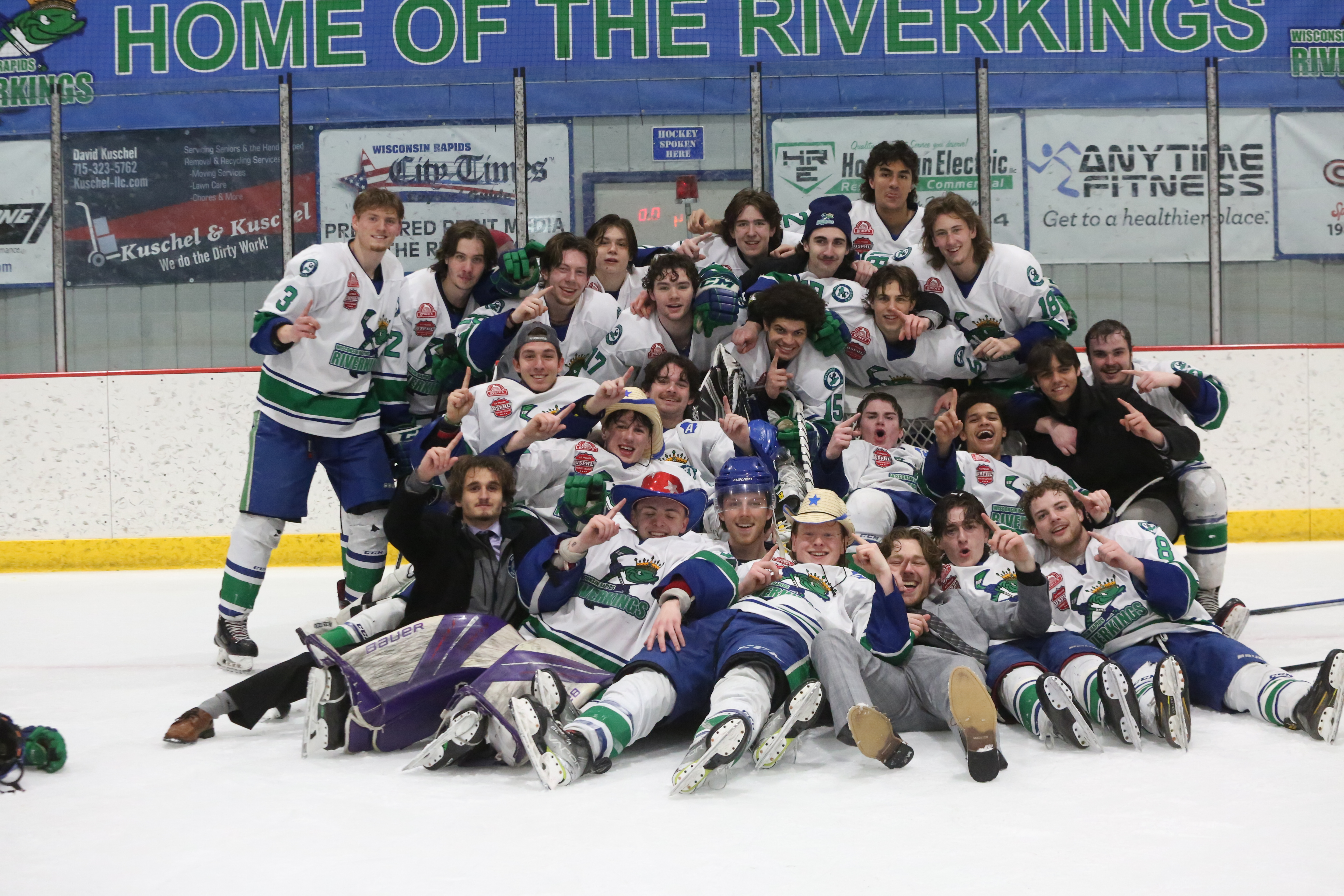 Riverkings hockey players after winning playoff game.