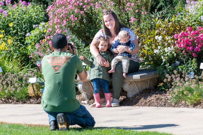 Family poses for a photo at Green Bay Botanical Garden.