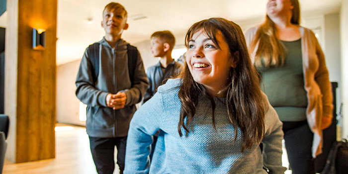 A family in a hotel lobby