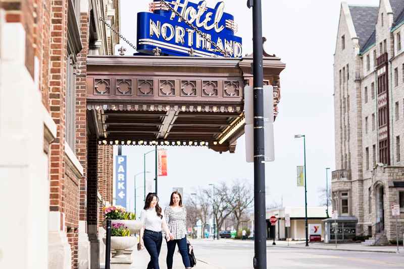 friends walking downtown green bay