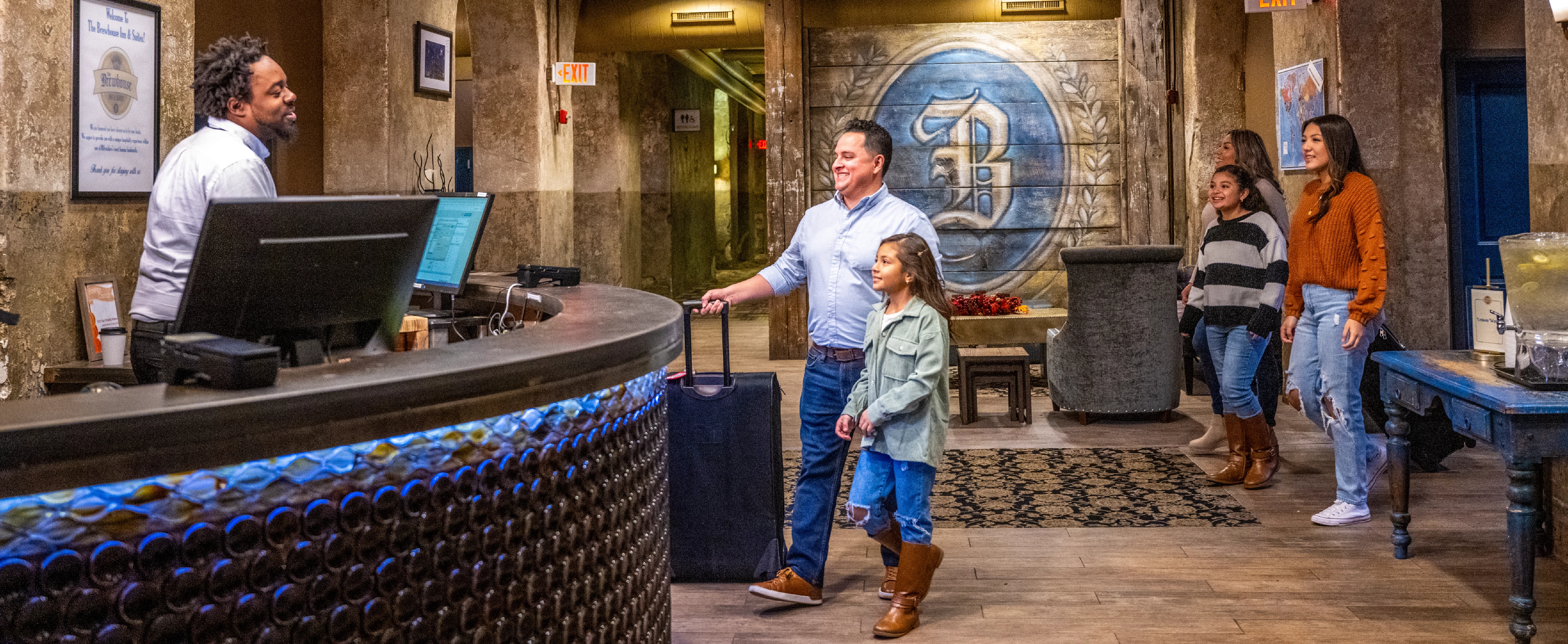 054 Family Checking in at Brewhouse Inn and Suites