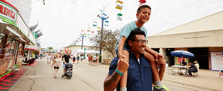 Son on Fathers Shoulders at the State Fair