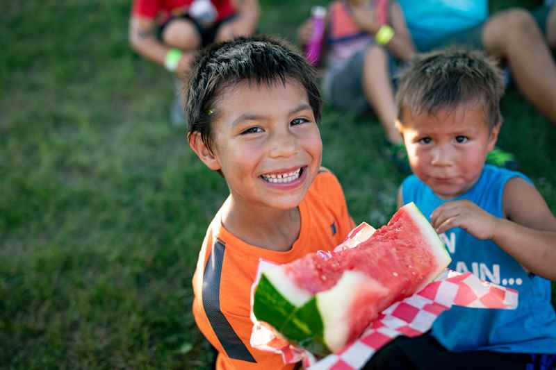 kids smiling with watermellon