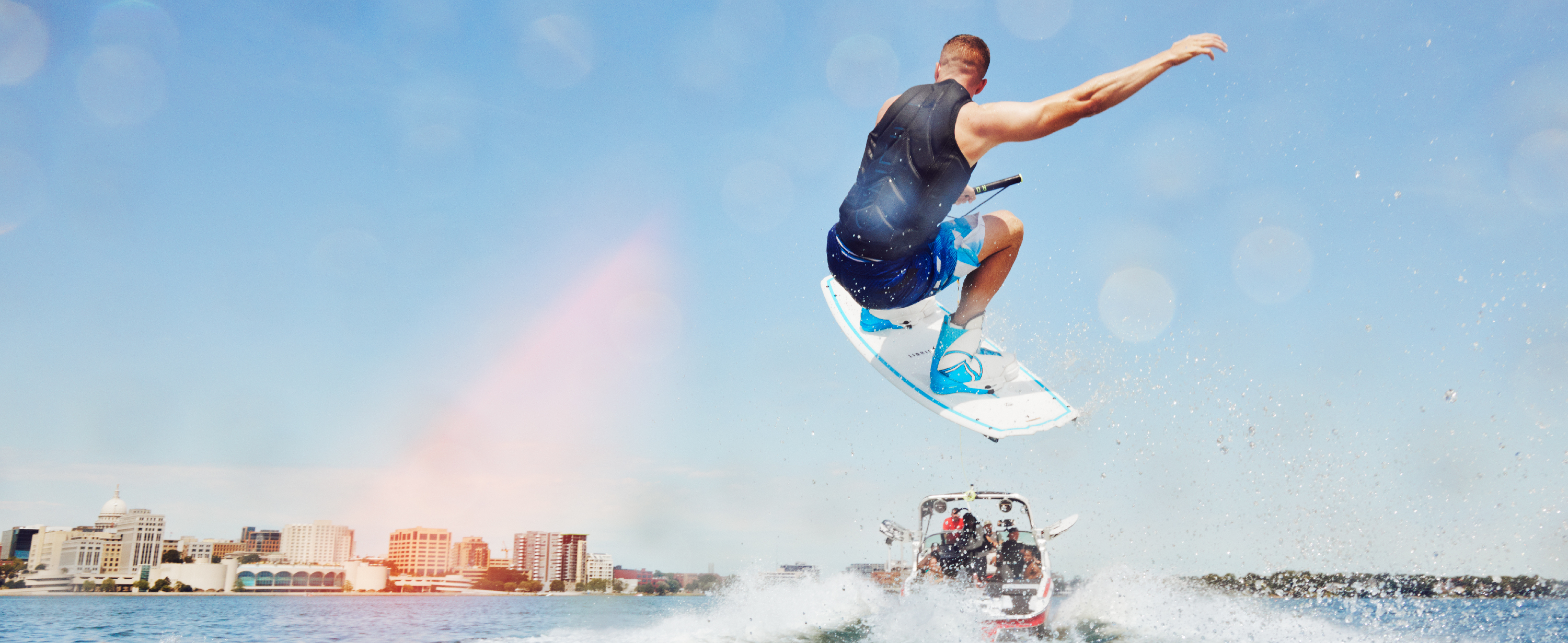 Water Skiing-195 Man Does A Wakeboard Trick