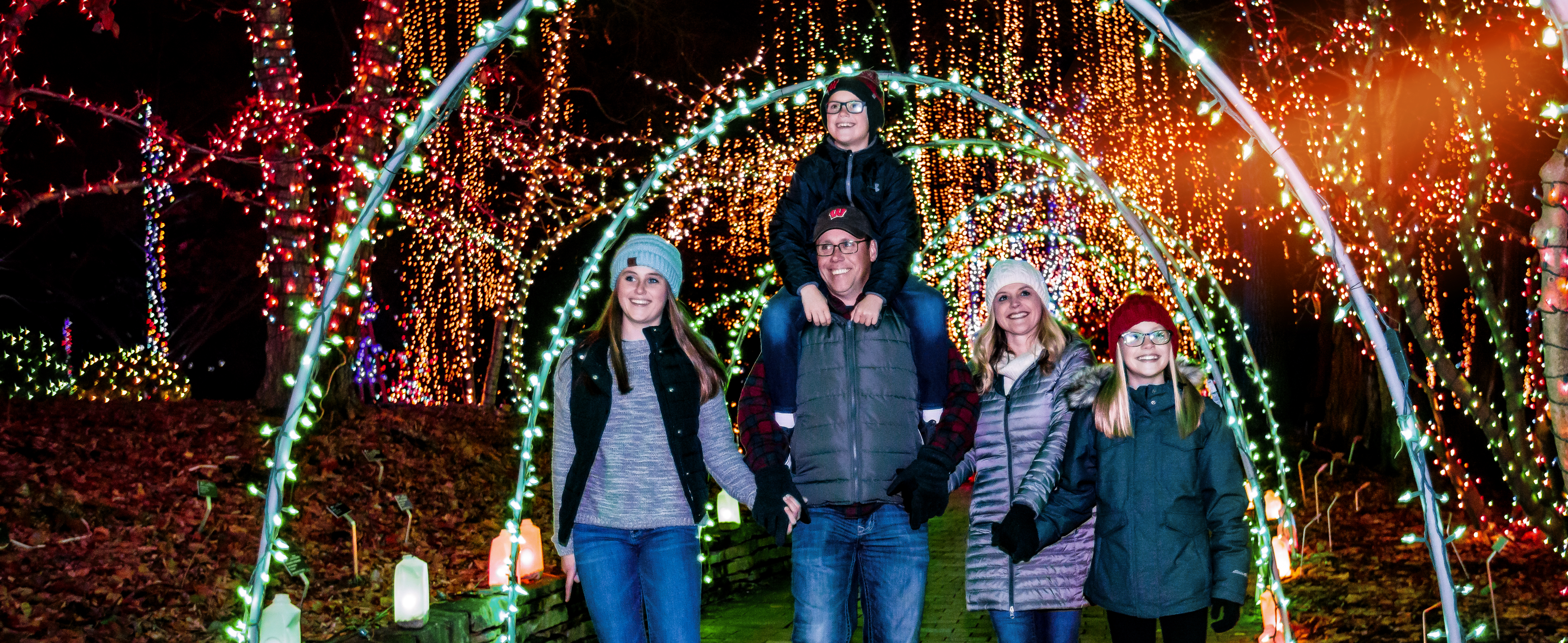 Things to Do - 015 Family Walking Through Light Tunnel
