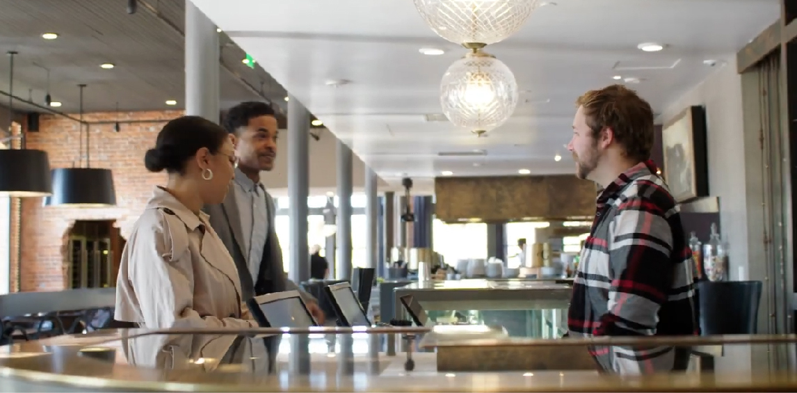A couple sitting together in a cafe
