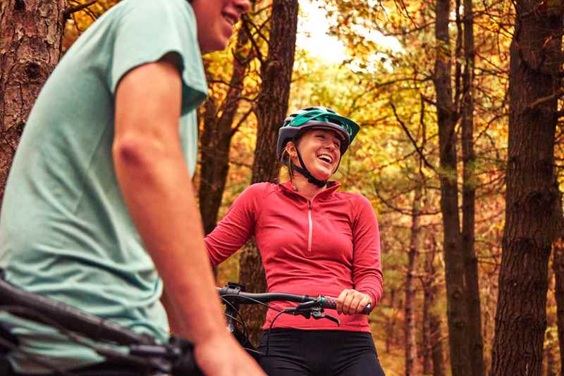 Family Rides Mountain Bikes At Levis Mound Trail In Neillsville