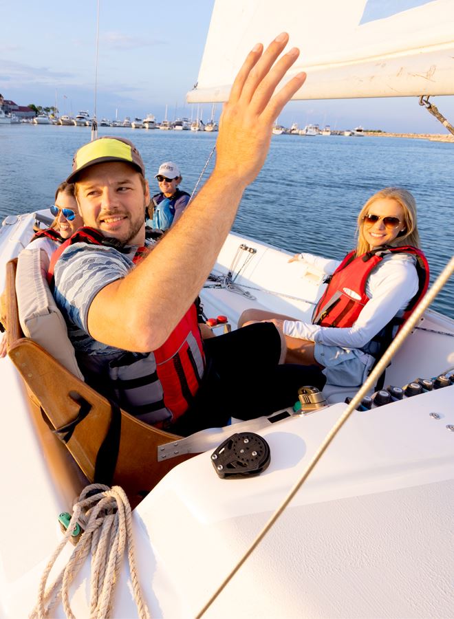 friend group goes adaptive sailing on lake michigan