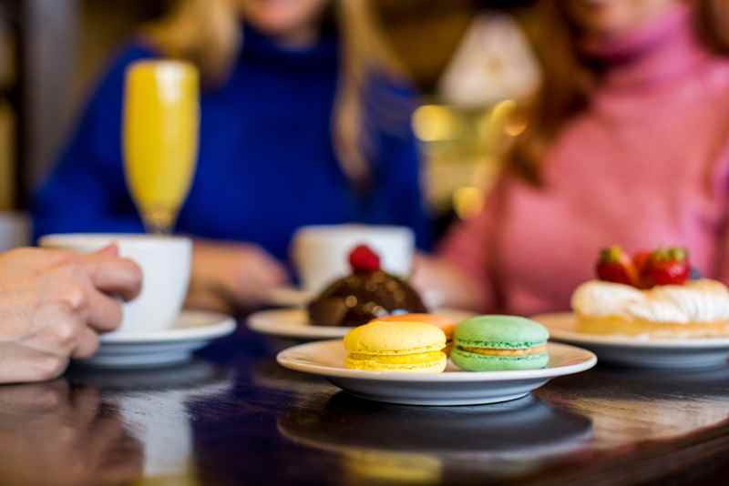 Women with Pastries at Le Reve Patisserie