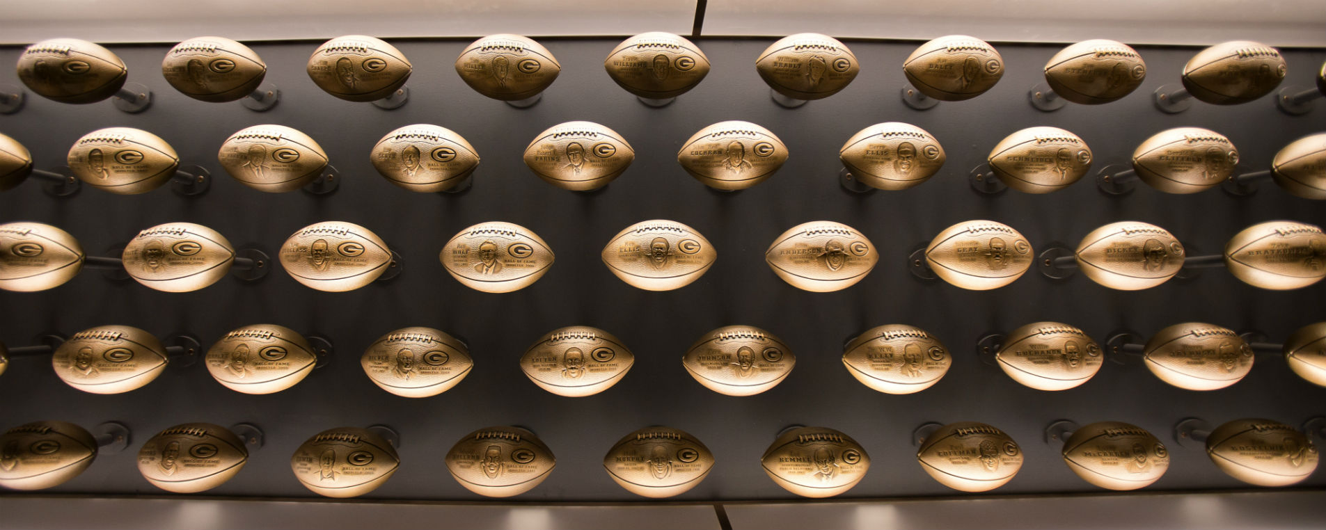 Wall of Footballs in Packers Hall of Fame Induction