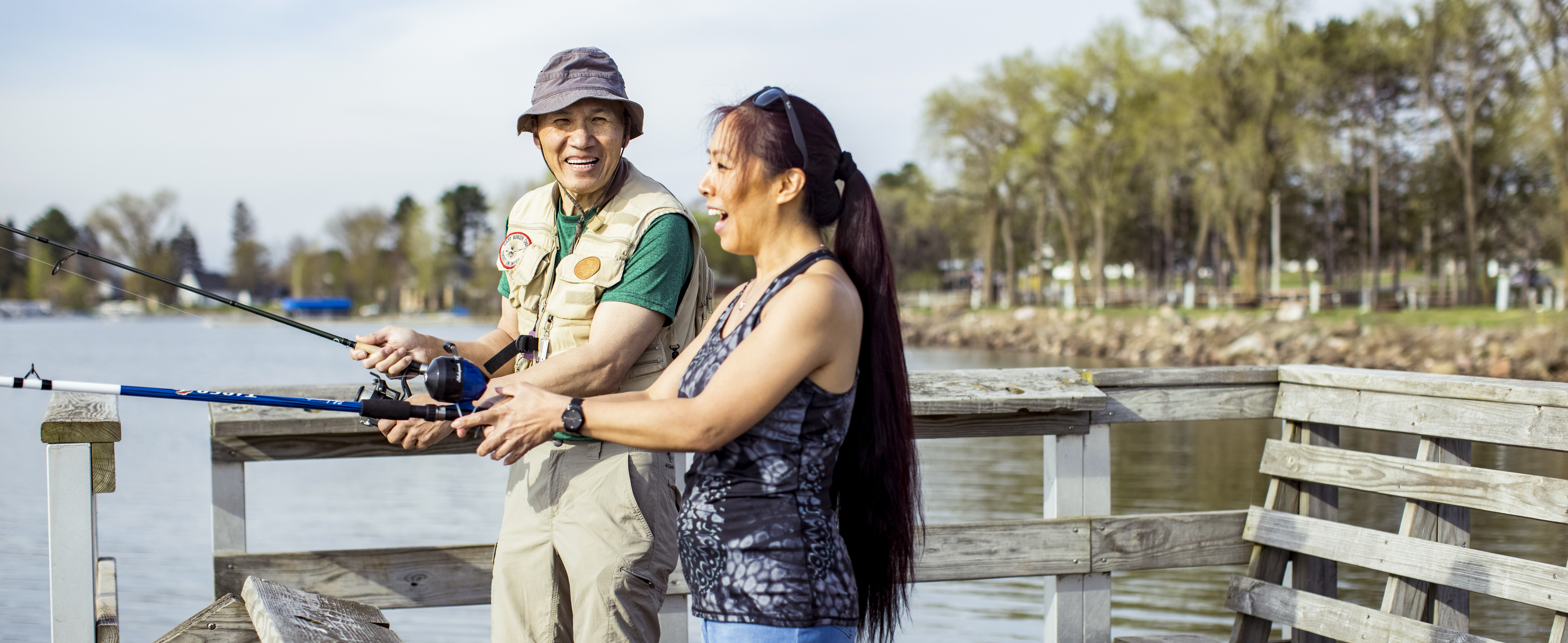 Father and Daughter Fishing at Memorial Park on Shell Lake in Washburn County