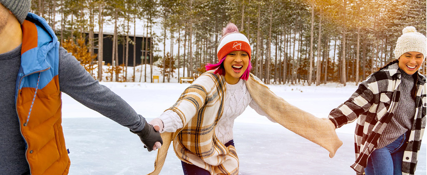 Outdoors - 036 Friends Holding Hands and Ice Skating