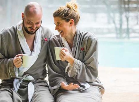 Couple in a spa loading=