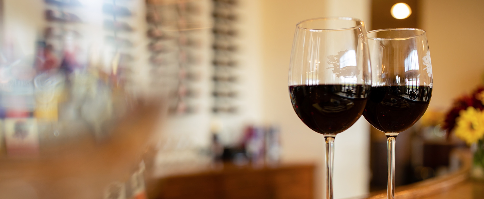 Glasses of wine on bar